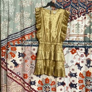 TCEC women’s gold dress.